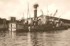 Elbe barge unloading dredger