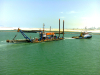HAM 250 working in Dubai on Deira Islands project. Scrapped soon after this. | Image by  Jaap van den Heuvel
